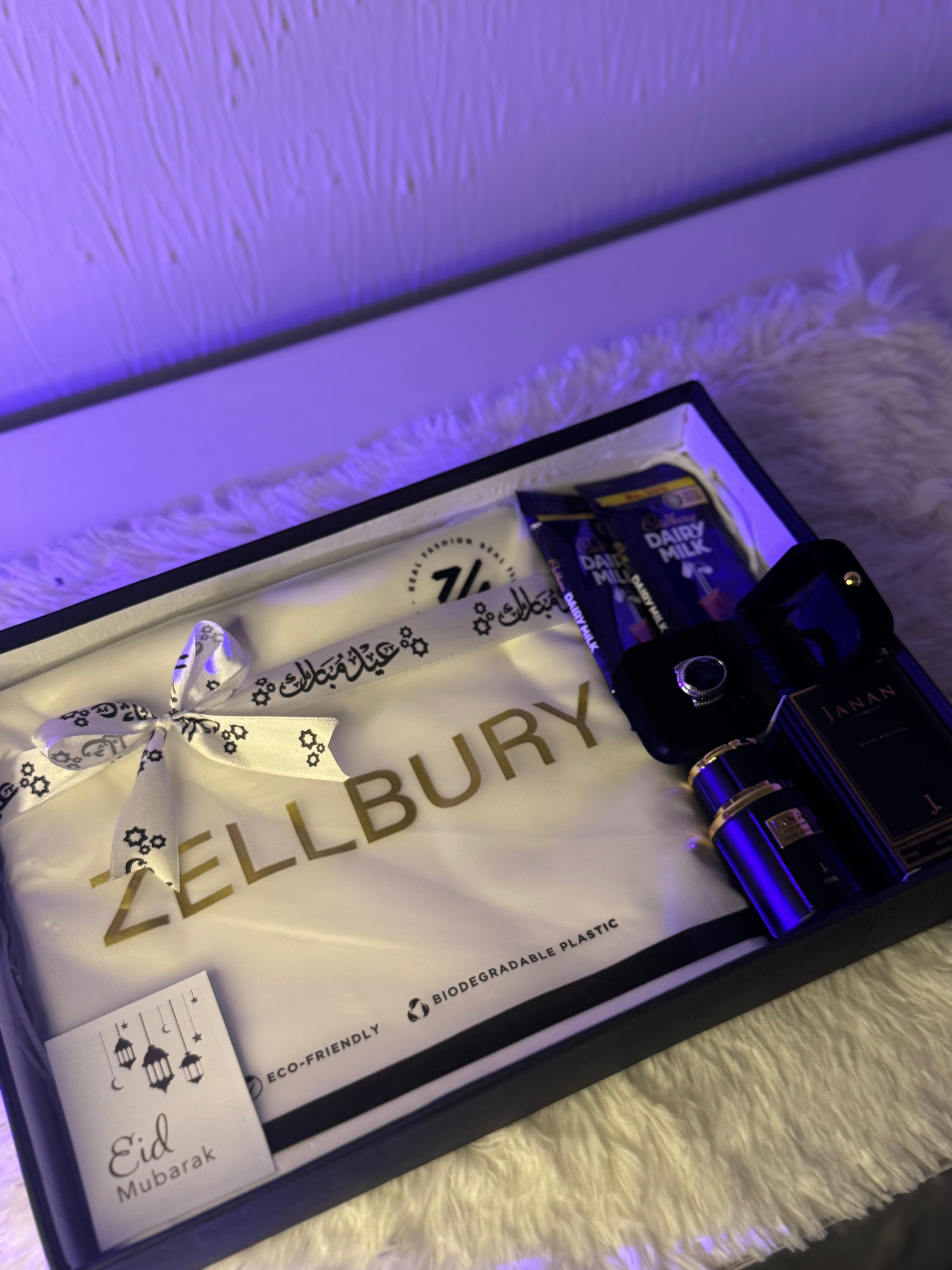 Luxury Men’s Giftbox – Branded Suit, Perfume, Ring & Chocolates Luxury Men’s Giftbox – Branded Suit, Perfume, Ring & Chocolates