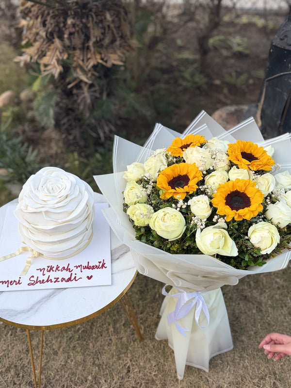 White themed Cake and Flowers