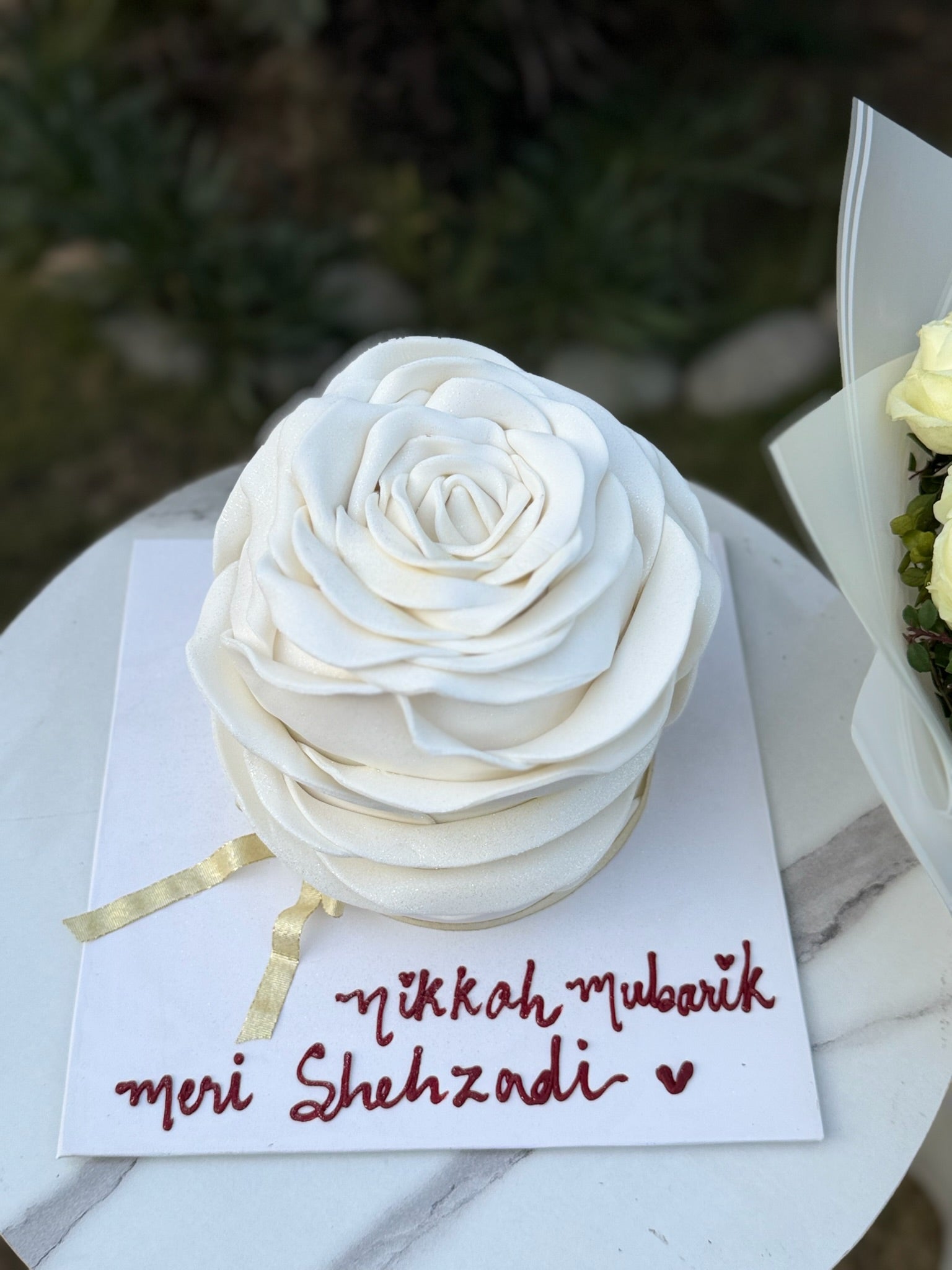 White themed Cake and Flowers