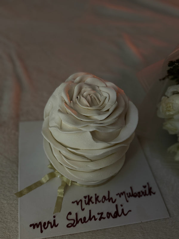 White themed Cake and Flowers